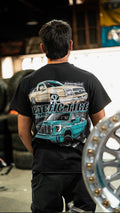 Back of the black Pacific Tire Visalia truck tee with full truck graphic