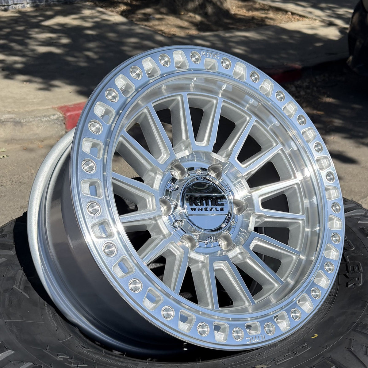 KMC KM557 Vista Gloss Silver Machined wheel, angled view