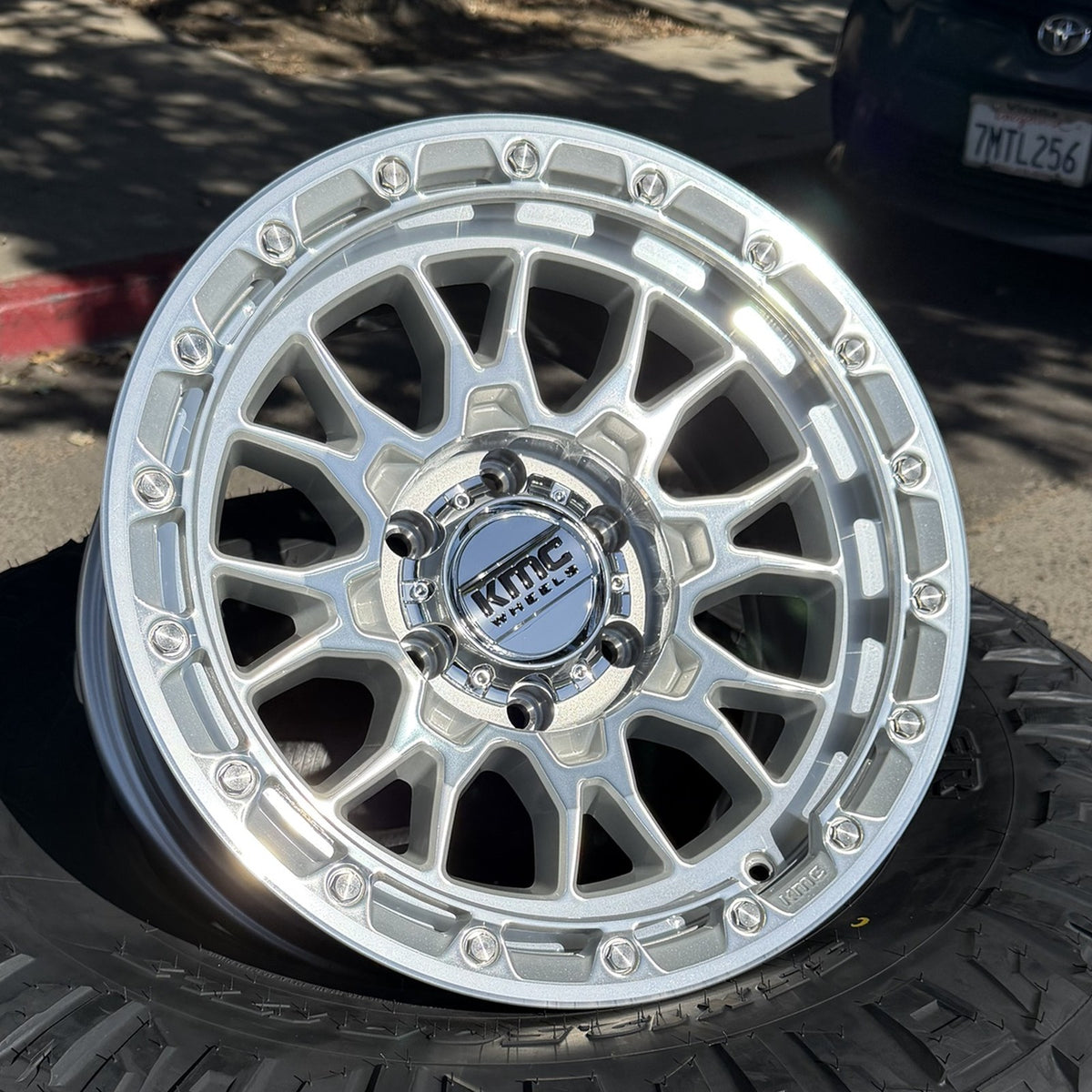 KMC KM558 Imperial Gloss Silver Machined wheel, angled view