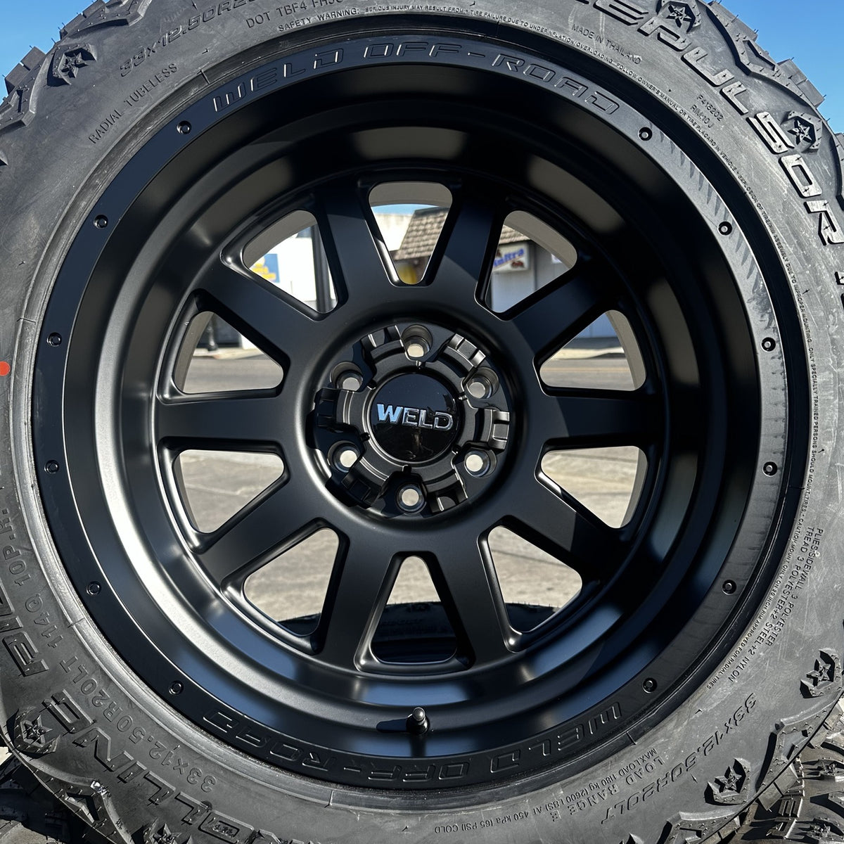 Weld Off-Road Stealth 20x12 satin black wheel front view
